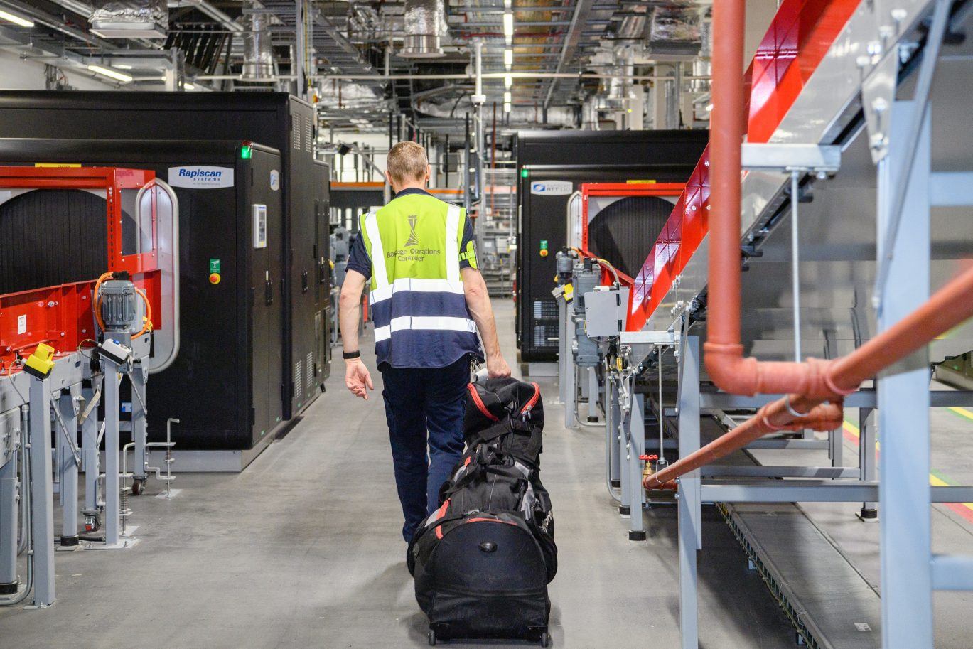 Man pulling suitcase